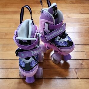 Purple and Black Truwheel Roller Skates Very Clean